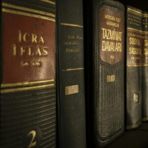 Detailed close-up of law and regulation books on a bookshelf, emphasizing education and knowledge.